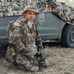 Ukrainian pastor Oleg Magdych in fatigues near the Russian front.