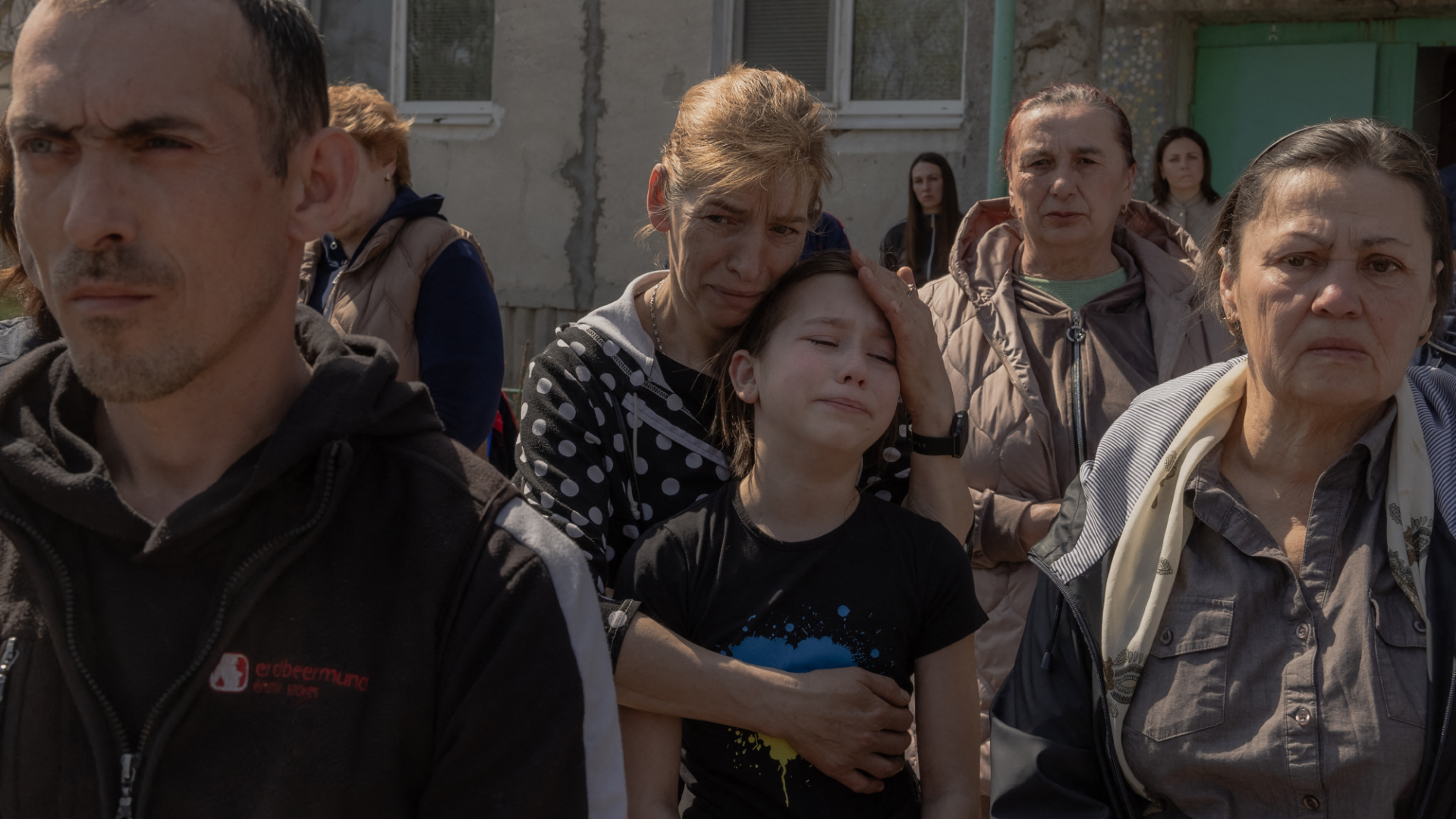 Ukrainian faces at the funeral of an evangelical family killed in Sumy by Russian airstrike